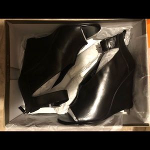 Black, leather wedges